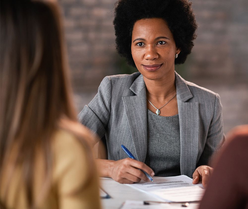 Female Banker Discussing Loans & Lines of Credit